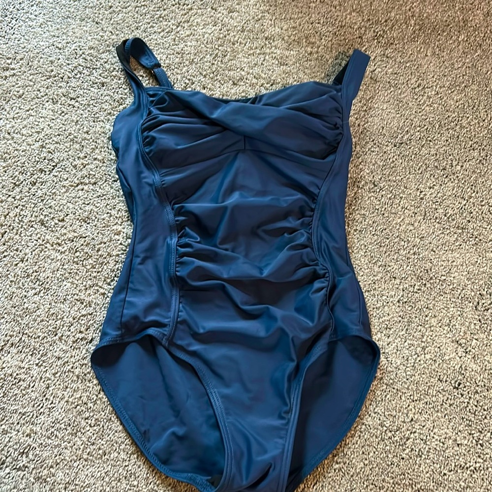 Dark blue swim suit.